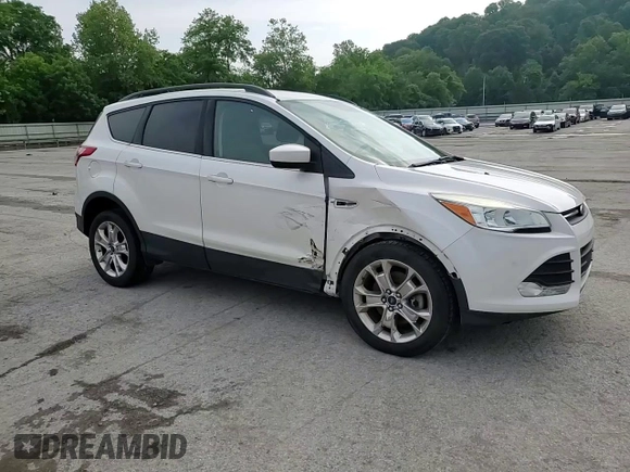 2016 Ford Escape SE z VIN 1FMCU9G97GUB45352, wystawiony jako Copart lot #60001055 z przebiegiem 93 685 mil mil oraz Szkoda całkowita • Salvage title. Historia ofert i sprzedaży dostępna na DreamBid. Obrazek 14.