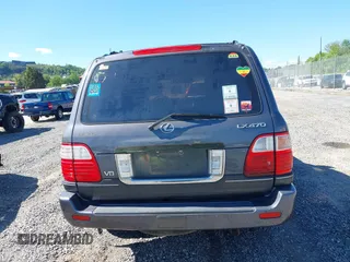 2003 Lexus LX with VIN JTJHT00W233532297, listed as a IAAI auction lot 42189676 with 235,992 mi miles. Bid and sale history available at carsss.com. Image 16.