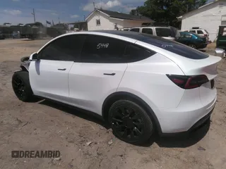 2022 Tesla Model Y Long Range z VIN 7SAYGDEE3NF385933, wystawiony jako IAAI lot #42059675 z przebiegiem 88 488 mil mil oraz . Historia ofert i sprzedaży dostępna na DreamBid. Obrazek 3.