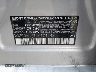 2003 Mercedes-Benz E-Class 3.2L with VIN WDBUF65J83A124342, listed as a IAAI auction lot 41951596 with 185,094 mi miles. Bid and sale history available at carsss.com. Image 9.