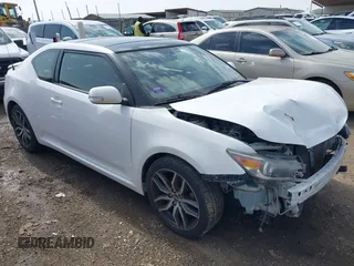 2014 Scion tC z VIN JTKJF5C77E3081151, wystawiony jako IAAI lot #41565368 z przebiegiem 85 785 mil mil oraz . Historia ofert i sprzedaży dostępna na DreamBid. Obrazek 1.