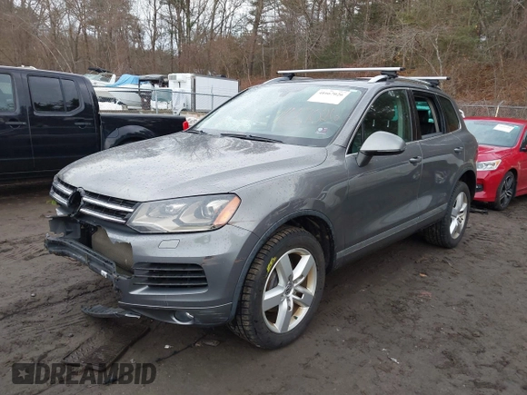 2013 Volkswagen Touareg Lux with VIN WVGEF9BP0DD005082, listed as a IAAI auction lot 41667026 with 140,148 mi miles and . Bid and sale history available at DreamBid. Image 18.