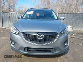 2014 Mazda CX-5 Grand Touring with VIN JM3KE2DY8E0375025, listed as a IAAI auction lot 41657755 with 103,601 mi miles. Bid and sale history available at carsss.com. Image 12.