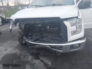 2015 Ford F-150 XLT w/HD Payload Pkg with VIN 1FTFW1EG3FFC39052, listed as a IAAI auction lot 41046847 with 151,061 mi miles. Bid and sale history available at carsss.com. Image 6.