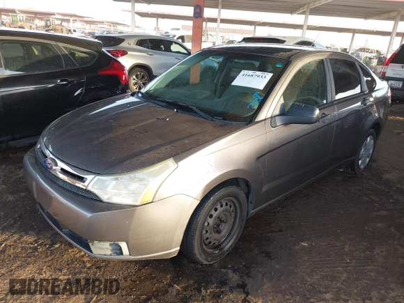 2011 Ford Focus S with VIN 1FAHP3EN7BW167384, listed as a IAAI auction lot 41687933 with 153,124 mi miles. Bid and sale history available at carsss.com. Image 2.