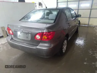 2004 Toyota Corolla CE with VIN 1NXBR32E14Z204650, listed as a IAAI auction lot 41710452 with 168,099 mi miles. Bid and sale history available at carsss.com. Image 4.