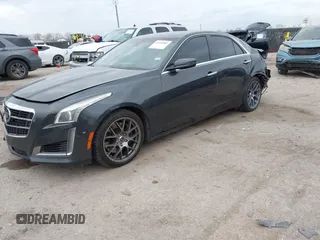 2014 Cadillac CTS Vsport Premium RWD z VIN 1G6AV5S8XE0175517, wystawiony jako IAAI lot #41126885 z przebiegiem 140 667 mil mil oraz . Historia ofert i sprzedaży dostępna na DreamBid. Obrazek 2.