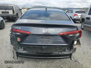 2024 Honda Civic Touring z VIN 2HGFE1F98RH336464, wystawiony jako Copart lot #50504775 z przebiegiem 14 655 mil mil oraz Szkoda całkowita • Salvage title. Historia ofert i sprzedaży dostępna na DreamBid. Obrazek 6.