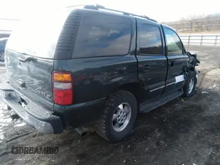 2003 Chevrolet Tahoe Special Service with VIN 1GNEK13V33J215889, listed as a IAAI auction lot 41219639 with 157,570 mi miles. Bid and sale history available at carsss.com. Image 4.