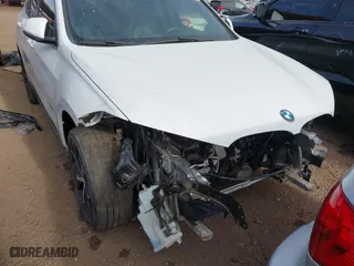 2018 BMW X1 sDrive28i with VIN WBXHU7C32J5H41587, listed as a IAAI auction lot 41538394 with 125,804 mi miles. Bid and sale history available at carsss.com. Image 6.