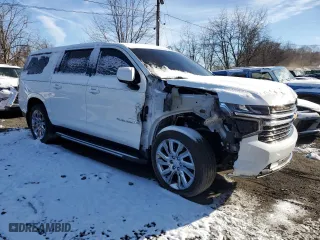 2021 Chevrolet Suburban LT with VIN 1GNSKCKD4MR401404, listed as a Copart auction lot 86254504 with 79,317 mi miles and Salvage Title. Bid and sale history available at carsss.com. Image 4.