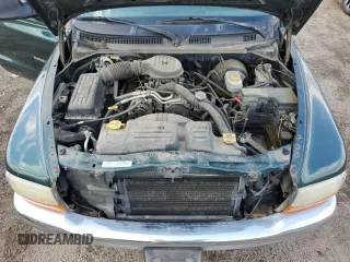 2001 Dodge Dakota z VIN 1B7HG2AX81S320355, wystawiony jako Copart lot #55410715 z przebiegiem 164 931 mil mil oraz Szkoda całkowita • Salvage title. Historia ofert i sprzedaży dostępna na DreamBid. Obrazek 11.