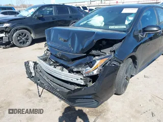 2021 Toyota Corolla SE with VIN 5YFS4MCE7MP064608, listed as a IAAI auction lot 41665091 with 59,697 mi miles. Bid and sale history available at carsss.com. Image 6.