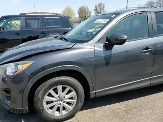 2016 Mazda CX-5 Touring with VIN JM3KE2CY2G0612029, listed as a Copart auction lot 53810155 with 159,915 mi miles and Salvage Title. Bid and sale history available at DreamBid. Image 14.