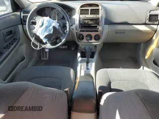 2006 Kia Spectra with VIN KNAFE161965323828, listed as a Copart auction lot 69583934 with 152,000 mi miles and Salvage Title. Bid and sale history available at carsss.com. Image 8.