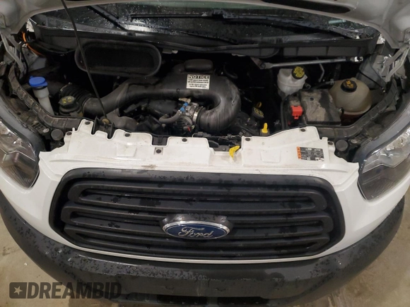 2019 Ford Transit with VIN 1FTYE2CM7KKB51357, listed as a Copart auction lot 52594215 with 94,789 mi miles and Salvage title. Bid and sale history available at DreamBid. Image 11.