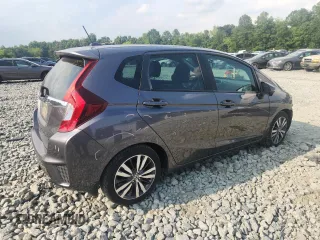 2015 Honda Fit EX-L with VIN 3HGGK5H87FM708737, listed as a Copart auction lot 64310745 with 90,446 mi miles and Salvage title. Bid and sale history available at DreamBid. Image 3.