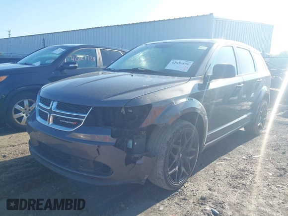2015 Dodge Journey SE z VIN 3C4PDCAB4FT675074, wystawiony jako IAAI lot #42059878 z przebiegiem 99 947 mil mil oraz . Historia ofert i sprzedaży dostępna na DreamBid. Obrazek 2.