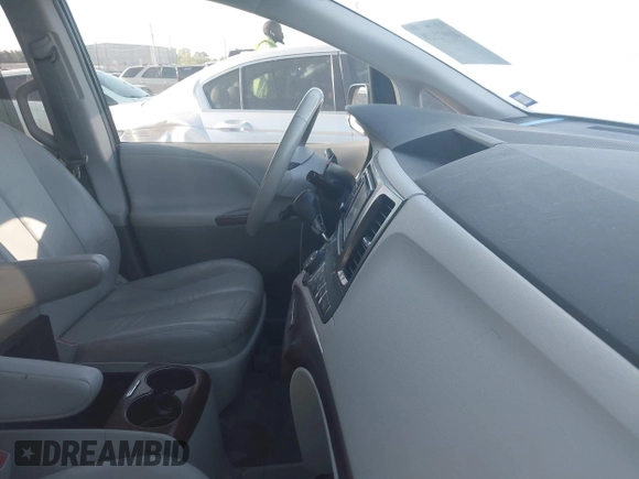 2014 Toyota Sienna XLE with VIN 5TDYK3DC8ES423450, listed as a IAAI auction lot 41972128 with 145,374 mi miles. Bid and sale history available at carsss.com. Image 5.