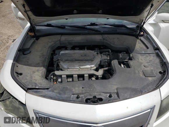 2012 Acura TL Technology z VIN 19UUA8F5XCA010244, wystawiony jako Copart lot #56526795 z przebiegiem 132 802 mil mil oraz Szkoda całkowita • Salvage title. Historia ofert i sprzedaży dostępna na DreamBid. Obrazek 11.