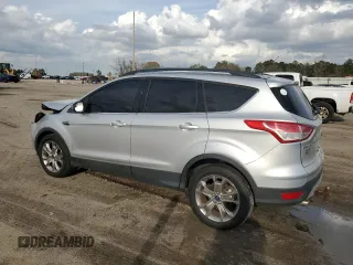 2015 Ford Escape SE with VIN 1FMCU0GX2FUB36390, listed as a Copart auction lot 49014075 with 108,115 mi miles and Salvage Title. Bid and sale history available at DreamBid. Image 2.