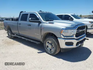 2022 Ram 2500 Tradesman z VIN 3C6UR5HJ7NG387674, wystawiony jako IAAI lot #42189557 z przebiegiem 125 045 mil mil oraz . Historia ofert i sprzedaży dostępna na DreamBid. Obrazek 1.