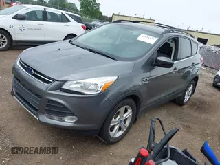2014 Ford Escape SE with VIN 1FMCU9GX4EUA83808, listed as a IAAI auction lot 42576737 with 116,074 mi miles and . Bid and sale history available at DreamBid. Image 2.