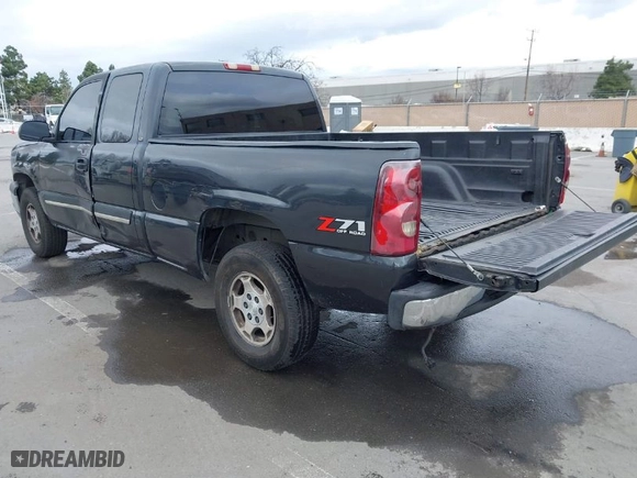 2003 Chevrolet Silverado 1500 LS with VIN 1GCEK19TX3E107860, listed as a IAAI auction lot 41461401 with 379,055 mi miles. Bid and sale history available at carsss.com. Image 3.
