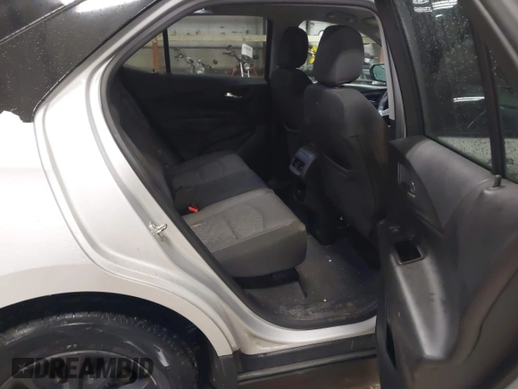 2018 Chevrolet Equinox LT z VIN 2GNAXSEV6J6198809, wystawiony jako IAAI lot #41945758 z przebiegiem 196 485 mil mil oraz . Historia ofert i sprzedaży dostępna na DreamBid. Obrazek 8.