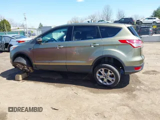 2013 Ford Escape SEL with VIN 1FMCU0HX1DUD51254, listed as a IAAI auction lot 41970516 with 83,616 mi miles. Bid and sale history available at carsss.com. Image 13.