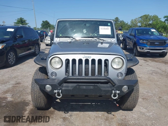 2014 Jeep Wrangler Sport with VIN 1C4AJWAG0EL126459, listed as a IAAI auction lot 42286803 with 179,025 mi miles and . Bid and sale history available at DreamBid. Image 12.