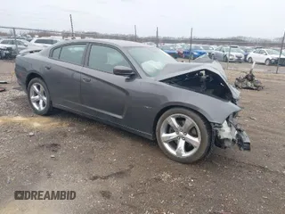 2014 Dodge Charger RT Plus with VIN 2C3CDXCT6EH159466, listed as a IAAI auction lot 41717142 with 104,462 mi miles. Bid and sale history available at carsss.com. Image 1.