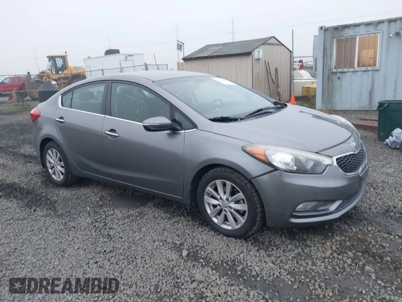 2014 Kia Forte EX with VIN KNAFX4A8XE5213014, listed as a IAAI auction lot 41000589 with 89,890 mi miles. Bid and sale history available at carsss.com. Image 1.