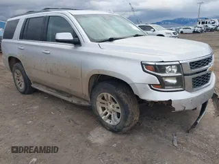 2019 Chevrolet Tahoe LT z VIN 1GNSKBKC7KR175468, wystawiony jako IAAI lot #41680274 z przebiegiem 159 155 mil mil oraz . Historia ofert i sprzedaży dostępna na DreamBid. Obrazek 1.