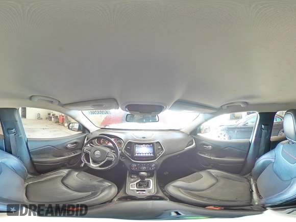 2015 Jeep Cherokee Trailhawk with VIN 1C4PJMBS1FW745928, listed as a Copart auction lot 62032585 with 132,559 mi miles and Salvage title. Bid and sale history available at DreamBid. Image 15.