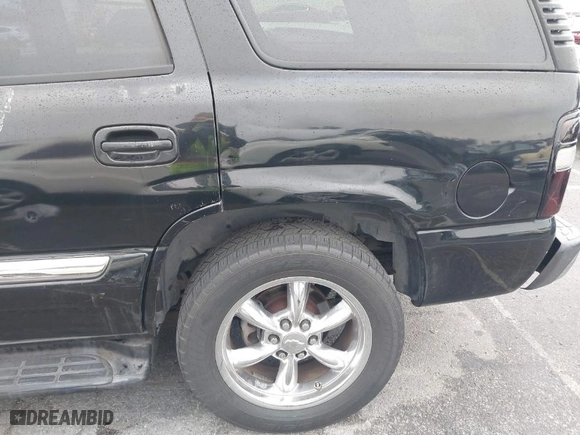 2006 GMC Yukon SLT with VIN 1GKEC13V46R138398, listed as a IAAI auction lot 41778033 with 158,568 mi miles. Bid and sale history available at carsss.com. Image 6.