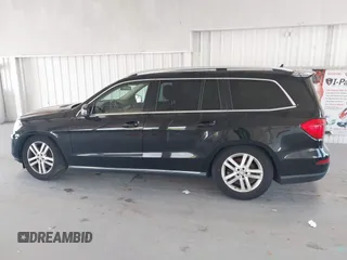 2014 Mercedes-Benz GL 450 z VIN 4JGDF7CE7EA435479, wystawiony jako IAAI lot #42280243 z przebiegiem 138 930 mil mil oraz . Historia ofert i sprzedaży dostępna na DreamBid. Obrazek 14.