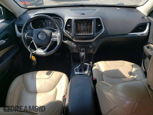 2016 Jeep Cherokee Limited with VIN 1C4PJLDB0GW136788, listed as a Copart auction lot 69684644 with 126,039 mi miles and Salvage title. Bid and sale history available at DreamBid. Image 8.