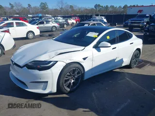 2021 Tesla Model S Long Range with VIN 5YJSA1E56MF453711, listed as a IAAI auction lot 41467603 with 115,634 mi miles and . Bid and sale history available at DreamBid. Image 19.