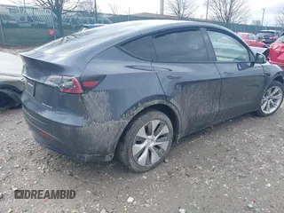 2023 Tesla Model Y Long Range with VIN 7SAYGDEE6PF824173, listed as a IAAI auction lot 41728613 with Not Provided miles and . Bid and sale history available at DreamBid. Image 4.
