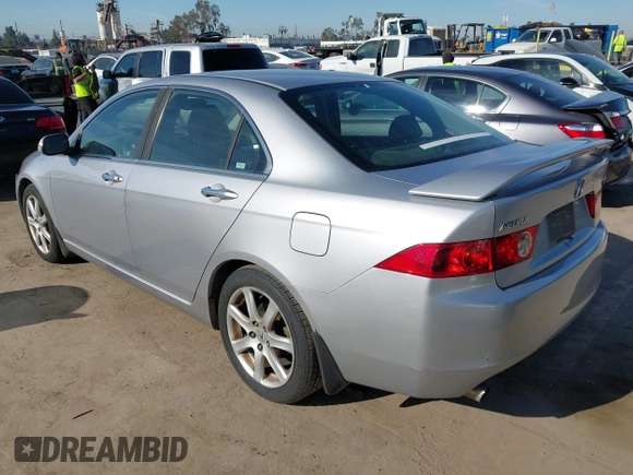 2004 Acura TSX w/Navigation with VIN JH4CL96944C002982, listed as a IAAI auction lot 41855710 with 165,129 mi miles. Bid and sale history available at carsss.com. Image 3.
