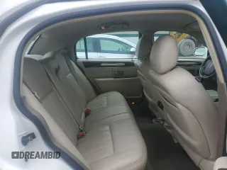 2005 Lincoln Town Car Signature z VIN 1LNHM81W75Y651123, wystawiony jako Copart lot #57106815 z przebiegiem 156 275 mil mil oraz Tytuł czysty. Historia ofert i sprzedaży dostępna na DreamBid. Obrazek 10.