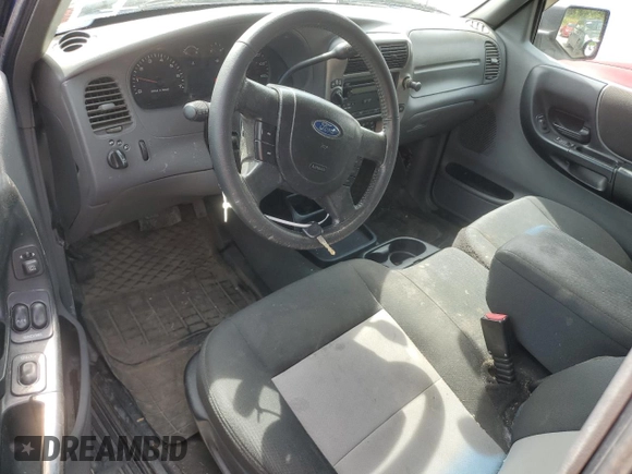 2006 Ford Ranger XL z VIN 1FTZR15EX6PA75411, wystawiony jako Copart lot #58711315 z przebiegiem 153 555 mil mil oraz Czysty tytuł • Clean title. Historia ofert i sprzedaży dostępna na DreamBid. Obrazek 8.