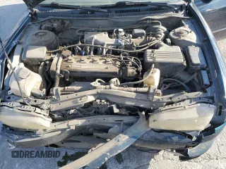 1997 Geo Prizm LSi z VIN 1Y1SK5283VZ442062, wystawiony jako Copart lot #80171294 z przebiegiem 340 180 mil mil oraz Szkody całkowita. Historia ofert i sprzedaży dostępna na DreamBid. Obrazek 13.