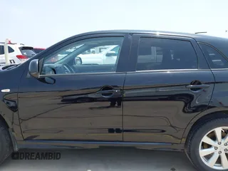 2012 Mitsubishi Outlander SE with VIN JA4AP4AU1CZ002844, listed as a IAAI auction lot 42297590 with 66,065 mi miles and . Bid and sale history available at DreamBid. Image 14.