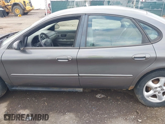 2003 Ford Taurus SE Standard with VIN 1FAFP53U43A233028, listed as a IAAI auction lot 42624211 with 65,364 mi miles and . Bid and sale history available at DreamBid. Image 14.