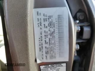 2002 Mitsubishi Galant ES z VIN 4A3AA46G12E123287, wystawiony jako Copart lot #74540784 z przebiegiem 259 181 mil mil oraz Szkoda całkowita • Salvage title. Historia ofert i sprzedaży dostępna na DreamBid. Obrazek 12.