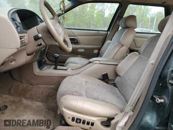 1995 Ford Taurus GL with VIN 1FALP52U8SA179395, listed as a Copart auction lot 53614265 with 71,082 mi miles and Salvage title. Bid and sale history available at DreamBid. Image 7.