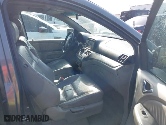 2007 Honda Odyssey EX-L z VIN 5FNRL38717B070328, wystawiony jako IAAI lot #41696829 z przebiegiem 171 229 mil mil oraz . Historia ofert i sprzedaży dostępna na DreamBid. Obrazek 5.