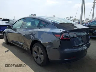 2023 Tesla Model 3 with VIN 5YJ3E1EA0PF518904, listed as a IAAI auction lot 42058540 with 20,945 mi miles and . Bid and sale history available at DreamBid. Image 3.